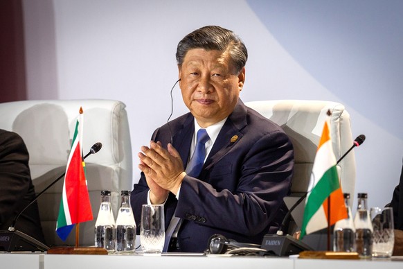 epa10817121 Chinese President Xi Jinping attends the Friends of BRICS Leaders dialogue during the 15th BRICS Summit, in Johannesburg, South Africa, 24 August 2023. South Africa is hosting the 15th BRI ...
