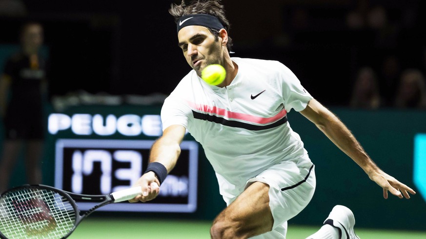 epa06525500 Roger Federer of Switzerland in action against Ruben Bemelmans of Belgium during their first round match of the ABN AMRO World Tennis Tournament in Rotterdam, Netherlands, 14 February 2018 ...