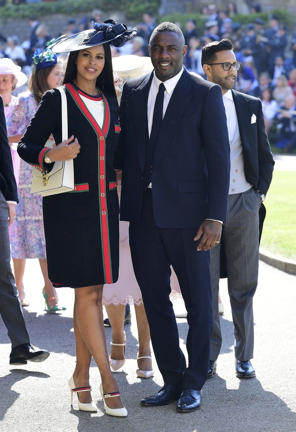 Idris Elba and Sabrina Dhowre arrive at St George&#039;s Chapel at Windsor Castle the wedding ceremony of Prince Harry and Meghan Markle at St. George&#039;s Chapel in Windsor Castle in Windsor, near  ...