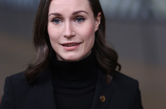 epa09644581 Finland&#039;s Prime Minister Sanna Marin arrives to attend a European Union Summit with all 27 EU leaders at The European Council Building in Brussels, Belgium, 16 December 2021. The quic ...