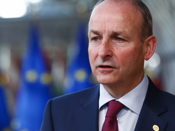 Ireland&#039;s Prime Minister Micheal Martin talks to journalists as he arrives for an EU summit in Brussels, Friday, Oct. 22, 2021. European Union leaders conclude a two-day summit on Friday in which ...