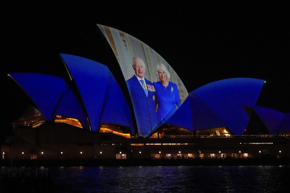 The Sydney Opera House sails show photos of Britain&#039;s King Charles and Queen camilla soon after their arrival in Sydney, Australia, Friday, Oct. 18, 2024. (AP Photo/Mark Baker)