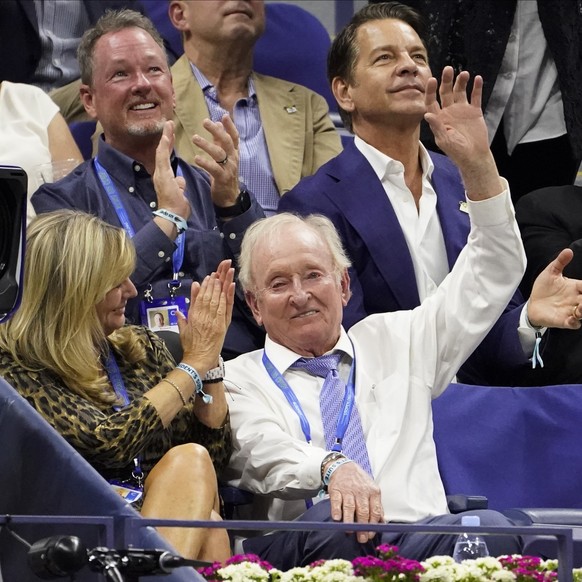 Rod Laver, second from left on bottom, waves to the crowd during the semifinals of the US Open tennis championships between Novak Djokovic, of Serbia, and Alexander Zverev, of Germany, Friday, Sept. 1 ...