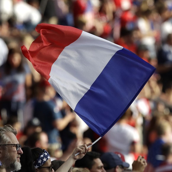 A french flag waves ahead of the Women's World Cup quarterfinal soccer match between France and the United States at Parc des Princes in Paris, France, Friday, June 28, 2019. (AP Photo/Alessandra ...