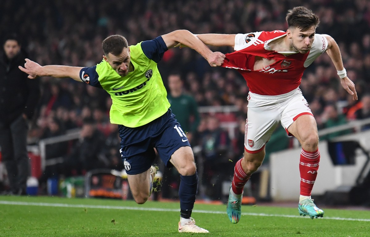 epa10284938 FC Zurich's Nikola Boranijasevic (L) tears the shirt of Arsenal?s Kieran Tierney during the UEFA Europa League group stage soccer match between Arsenal and FC Zurich at the Emirates S ...