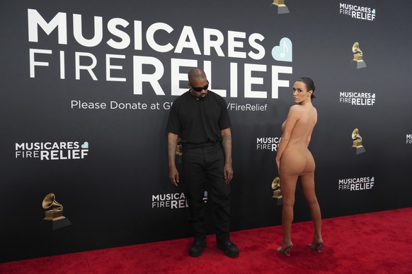 EDS NOTE: NUDITY - Kanye West, left, and Bianca Censori arrive at the 67th annual Grammy Awards on Sunday, Feb. 2, 2025, in Los Angeles. (Photo by Jordan Strauss/Invision/AP)
Kanye West,Bianca Censori