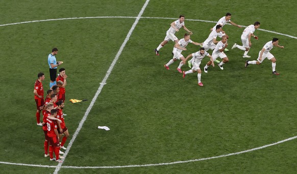 Spain&#039;s team runs to celebrate after winning the Euro 2020 soccer championship quarterfinal match between Switzerland and Spain at Saint Petersburg Stadium in St. Petersburg, Russia, Friday, July ...