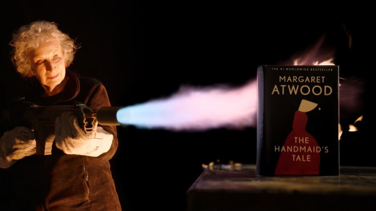 Margaret Atwood using a flamethrower on the "unburnable" version of "The Handmaid's Tale."