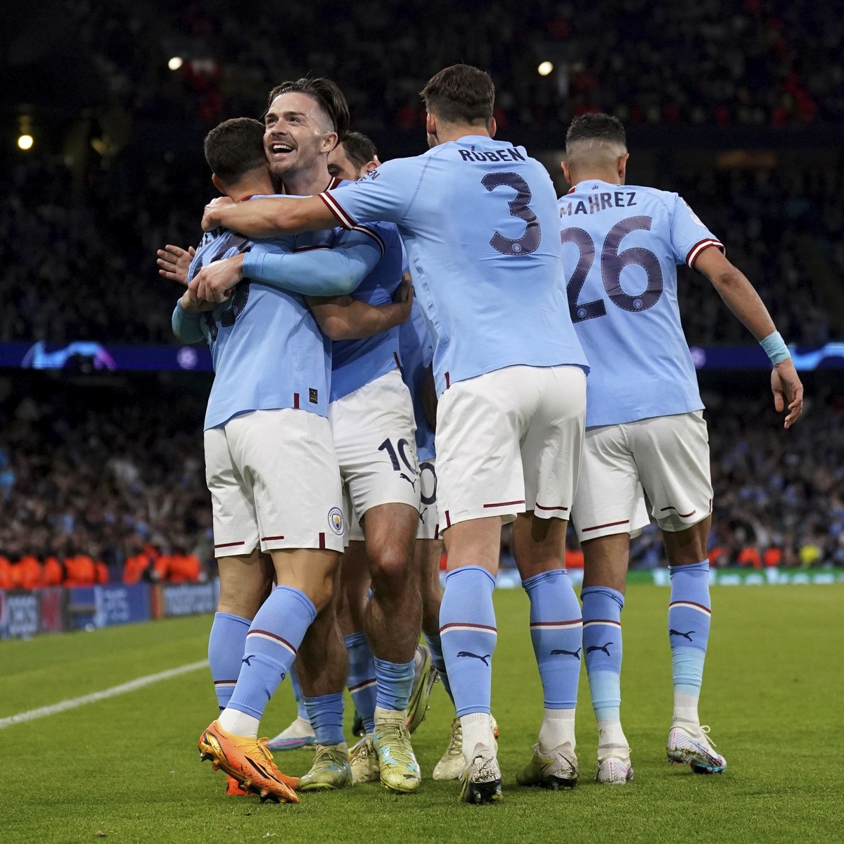 Manchester City's Jack Grealish celebrates the third goal scored by Julian Alvarez during the UEFA Champions League semi-final second leg match against Real Madrid at Etihad Stadium, Manchester.  ...