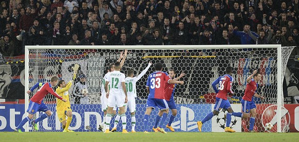Basel&#039;s Marek Suchy, right, scores a goal and cheers during an UEFA Champions League group B matchday 4 soccer match between Switzerland&#039;s FC Basel 1893 and Bulgaria&#039;s PFC Ludogorets Ra ...