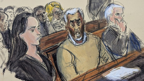FILE - In this courtroom sketch, flanked by defense attorneys Teny Geragos, left, and Brian Steel, right, Sean &quot;Diddy&quot; Combs, center, reacts after he was denied bail on prostitution-related  ...