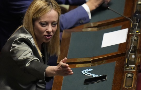 Brothers of Italy&#039;s leader Giorgia Meloni gestures during a voting session session of the new parliament, to choose the new Chamber&#039;s president, in Rome, Friday, Oct. 14, 2022. (AP Photo/Ale ...