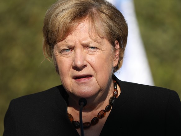 epa09516637 German Chancellor Angela Merkel during a visit at the Yad Vashem Holocaust memorial museum in Jerusalem, Israel, 10 October 2021. Germany's outgoing Chancellor Angela Merkel is on a farewe ...