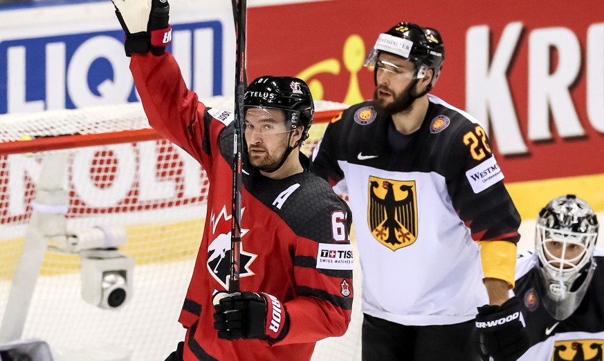 epa07581572 Mark Stone of Canada (L) celebrates his goal during the IIHF World Championship group A ice hockey match between Canada and Germany at the Steel Arena in Kosice, Slovakia, 18 May 2019. EPA ...