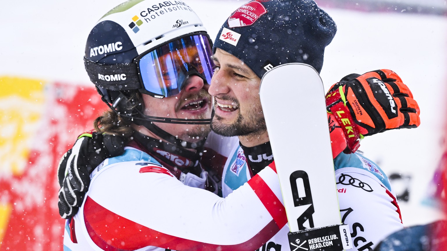 Manuel Feller of Austria, left, reacts with Johannes Strolz of Austria, during the second run of the men&#039;s slalom race at the Alpine Skiing FIS Ski World Cup in Adelboden, Switzerland, Sunday, Ja ...