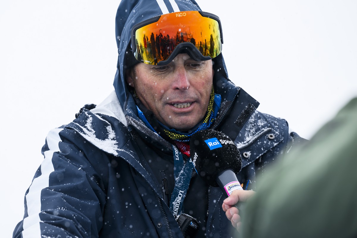 Markus Waldner, FIS Chief Race Director, speaks to journalist under the snow during the men's downhill training race on the new ski course "Gran Becca" at the Alpine Skiing FIS Ski Worl ...