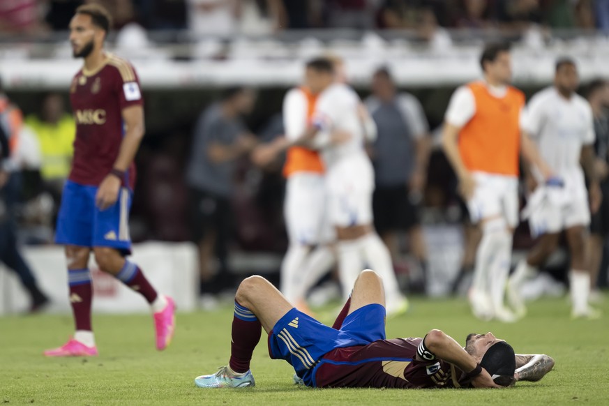 Servette&#039;s defender Steve Rouiller looks disappointed after losing the UEFA Champions League Third qualifying round second leg soccer match between Switzerland&#039;s Servette FC and Scotland&#03 ...