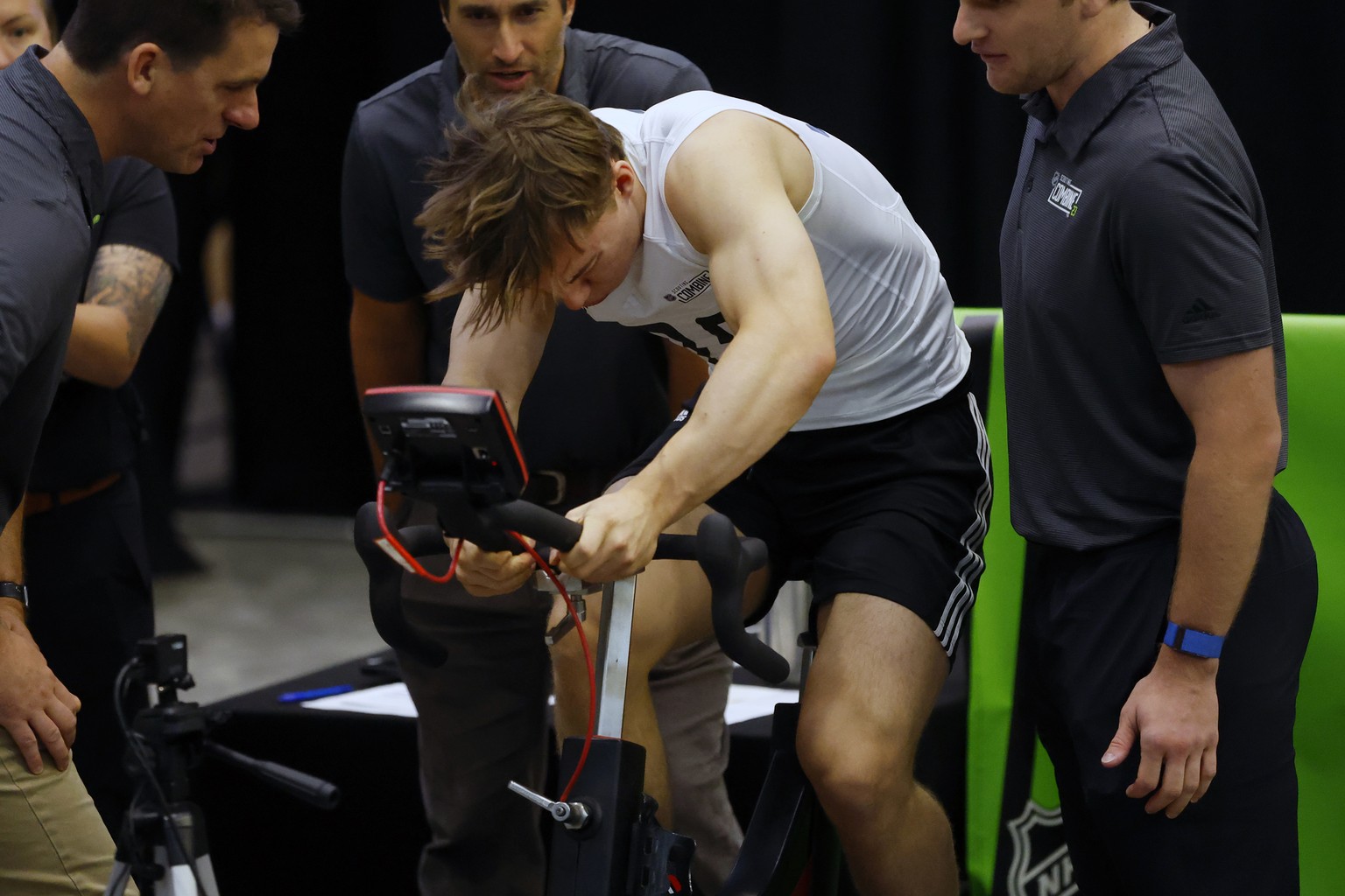 Connor Bedard rides the bike during the NHL hockey combine, Saturday, June 10, 2023, in Buffalo, N.Y. (AP Photo/Jeffrey T. Barnes)