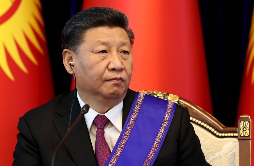 epa07644842 China&#039;s President Xi Jinping during a press conference with Kyrgyz President Sooronbay Jeenbekov (not seen) following a meeting in Bishkek, Kyrgyzstan, 13 June 2019. Xi Jinping is on  ...