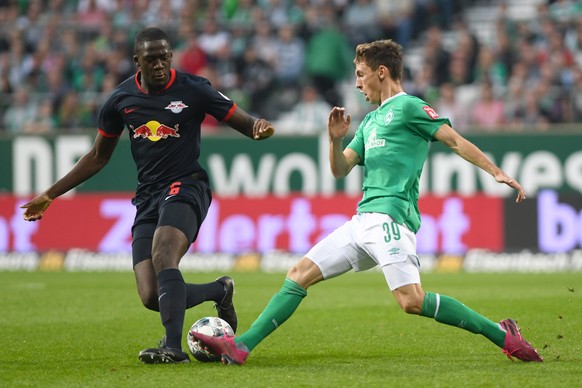 epa07859783 Bremen&#039;s Benjamin Goller (R) in action against Leipzig&#039;s Ibrahima Konate (L) during the German Bundesliga soccer match between SV Werder Bremen and RB Leipzig in Bremen,Â Germany ...