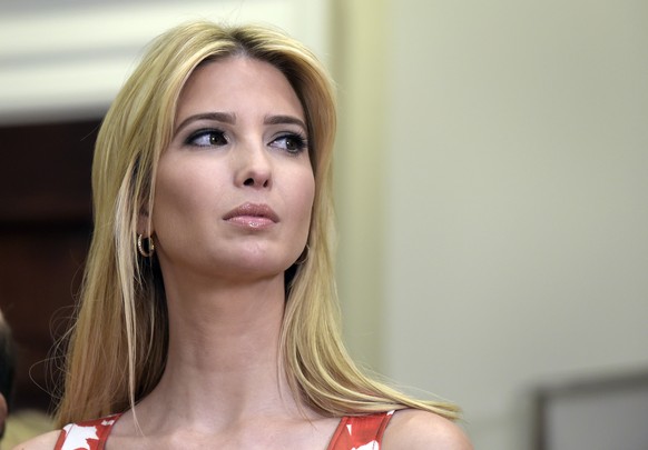 FILE - In this June 15, 2017, file photo, Ivanka Trump listens as President Donald Trump speaks in the Roosevelt Room of the White House in Washington, during an event on Apprenticeship and Workforce  ...