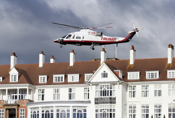 FILE - In this July 29, 2015 file photo, a helicopter owned by Donald Trump departs from the Turnberry golf course in Turnberry, Scotland. A financial report filed with the British government shows Do ...