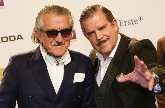 Dieter Meier, left, and Boris Blank, of Switzerland, of the band Yello arrive the 2015 Echo Music Awards in Berlin, Thursday, March 26, 2015. The German music awards are held every year by the German  ...