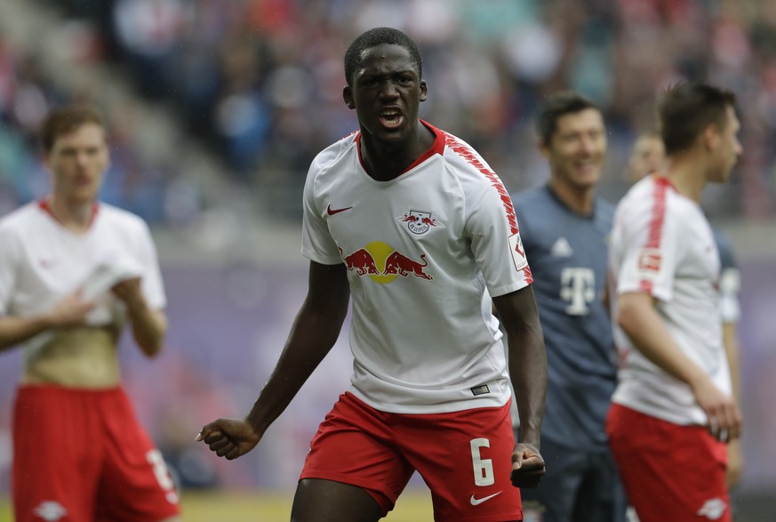 Leipzig&#039;s Ibrahima Konate reats during the German Bundesliga soccer match between Leipzig and Bayern Munich at the Red Bull Arena stadium in Leipzig, Germany, Saturday, May 11, 2019. (AP Photo/Mi ...