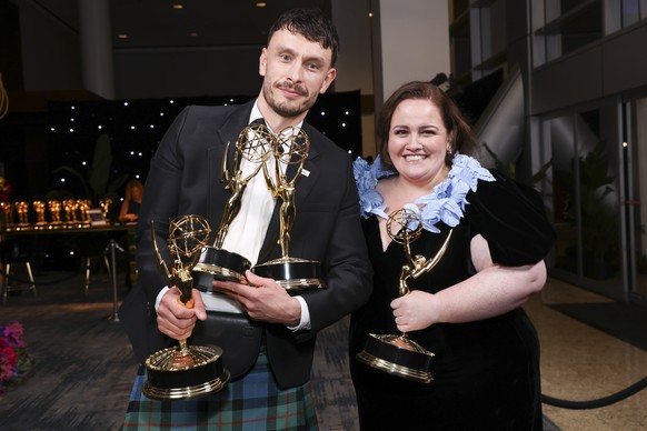 IMAGE DISTRIBUTED FOR THE TELEVISION ACADEMY ? Richard Gadd, left, and Jessica Gunning pick up their official Emmy statuette for outstanding writing for a limited or anthology series or movie for &quo ...