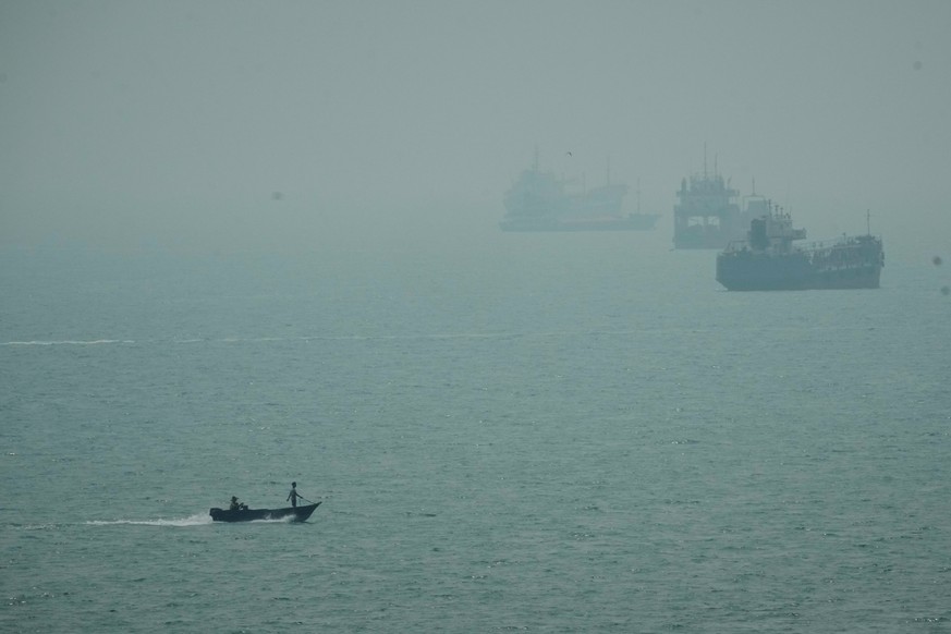 A motorboat travels past commercial vessels anchored amid haze in the Strait of Hormuz off Bandar Abbas, Iran, Monday, Sept. 7, 2026. (AP Photo/Vahid Salemi)
APTOPIX Iran War Strait of Hormuz
