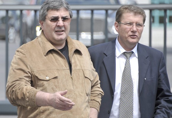 Chechen businessman and Neuchatel Xamax Football Club owner Bulat Chagaev (L) arrives with Club President Andrei Rudakov for the club annual lunch in Neuchatel, Switzerland, Friday, 27 May, 2011. Chag ...