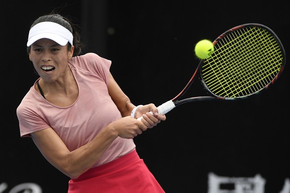 Taiwan&#039;s Hsieh Su-Wei hits a backhand return to Switzerland&#039;s Stefanie Voegele during their first round match at the Australian Open tennis championships in Melbourne, Australia, Tuesday, Ja ...