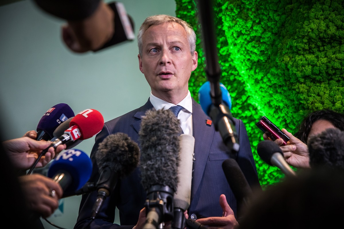 epa07592111 French Finance Minister Bruno Le Maire speaks to the press after his speech at the Organisation for Economic Co-operation and Development (OECD) ministerial council meeting in Paris, Franc ...