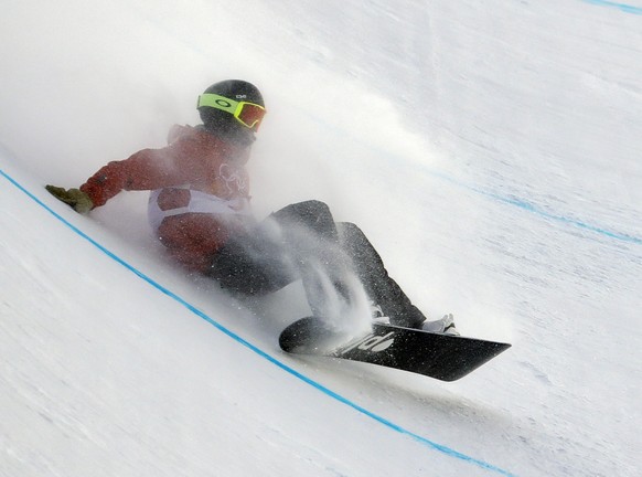 Elias Allenspach, of Switzerland, crashes during the men&#039;s halfpipe qualifying at Phoenix Snow Park at the 2018 Winter Olympics in Pyeongchang, South Korea, Tuesday, Feb. 13, 2018. (AP Photo/Lee  ...