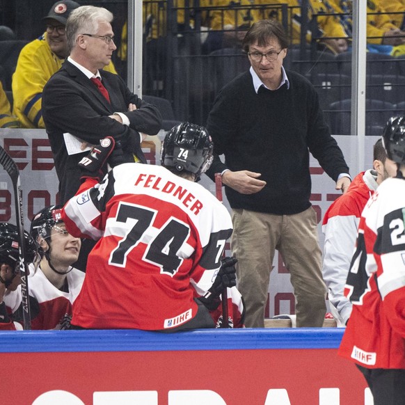 220514 Head coach Roger Bader and assistant coach Arno Del Curto of Austria during the 2022 IIHF Ice hockey, Eishockey World Championship, WM, Weltmeisterschaft game between Sweden and Austria on May  ...