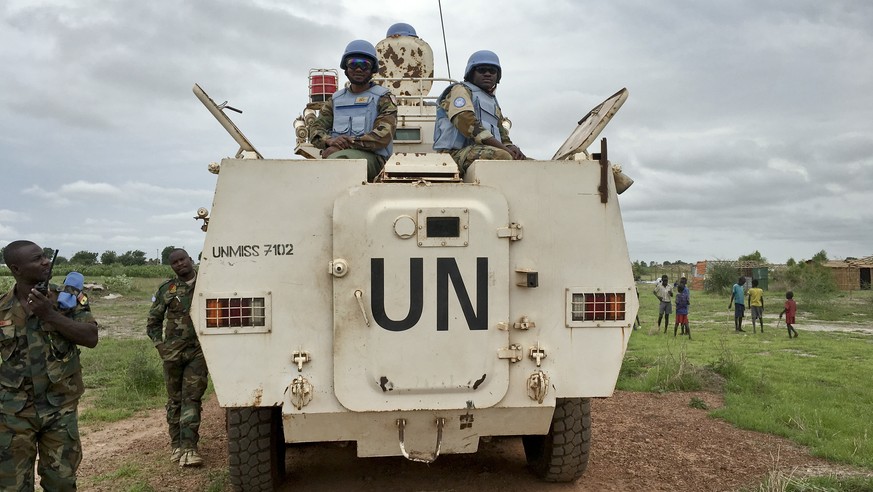 Peacekeepers from the United Nations Mission in the Republic of South Sudan (UNMISS) provide security during a visit of UNCHR High Commissioner Filippo Grandi to South Sudan&#039;s largest camp for th ...