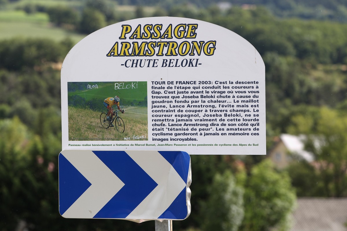 GAP, FRANCE - JULY 19: A signpost erected by amateur cyclists acknowledging an incident in the 2003 Tour when Spanish rider Joseba Beloki crashed on the descent from Col du Mense causing yellow jersey ...