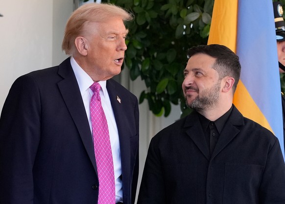 President Donald Trump, left, greets Ukraine&#039;s President Volodymyr Zelenskyy at the White House, Friday, Oct. 17, 2025, in Washington. (AP Photo/Alex Brandon)
Donald Trump,Volodymyr Zelenskyy