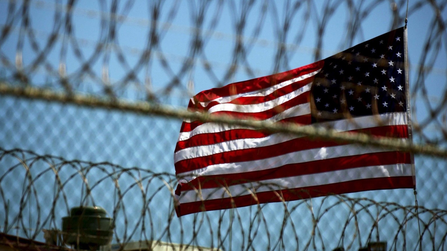 epa05488820 (FILE) A file picture dated 14 September 2005 shows a US flag at Delta Camp 5 on the United States Naval Station in Guantanamo Bay, Cuba. According to media reports on 16 August 2016, the  ...