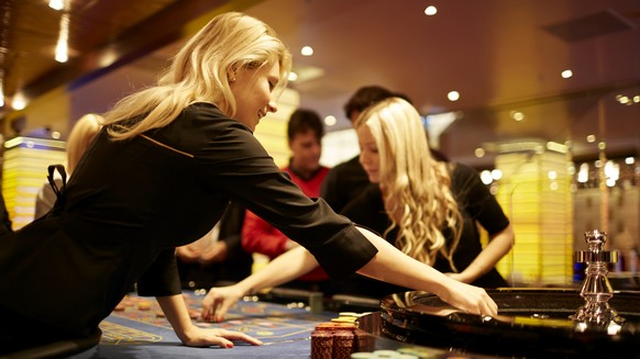 [Staged Picture / Gestellt Aufnahme] People play roulette at the Swiss Casino Zuerich in Zurich, Switzerland, on October 24, 2015. The Swiss Casino Zuerich was opened in 2012 and is the largest casino ...