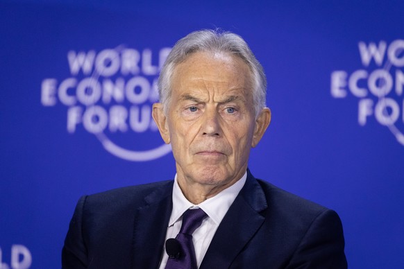 epa12194080 Sir Tony Blair, former Prime Minister of the United Kingdom and Executive Chairman of the Tony Blair Institute for Global Change, participates in a session at the World Economic Forum Annu ...