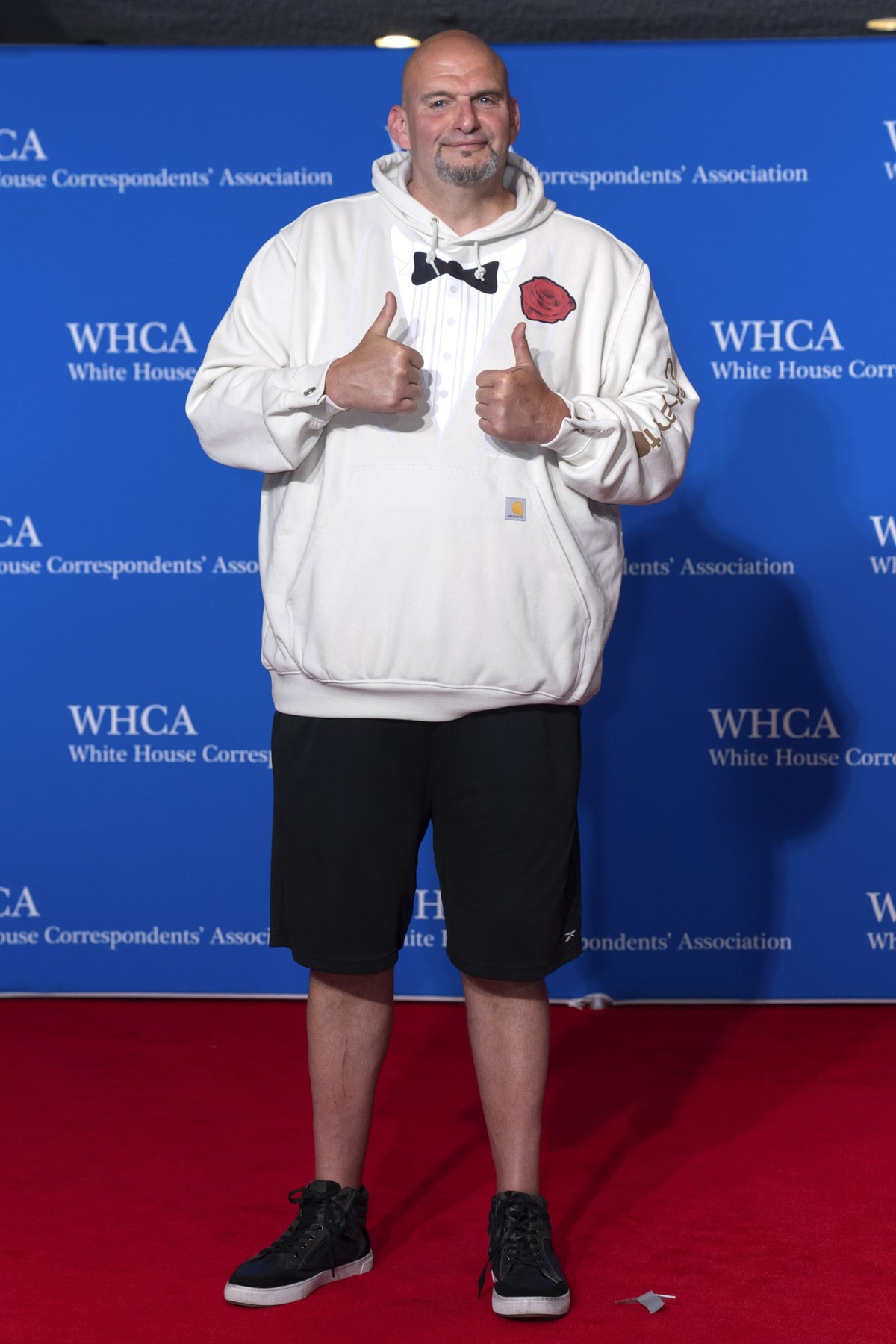 Sen. John Fetterman, D-Pa., poses for photographers as he arrives at the annual White House Correspondents' Association Dinner in Washington, Saturday, April 27, 2024. (AP Photo/Jose Luis Magana)
