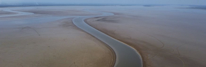 Boats travel through a section of the Amazon River affected by a severe drought in the state of Amazonas, near Manacapuru, Brazil, Wednesday, Sept. 27, 2023. (AP Photo/Edmar Barros)