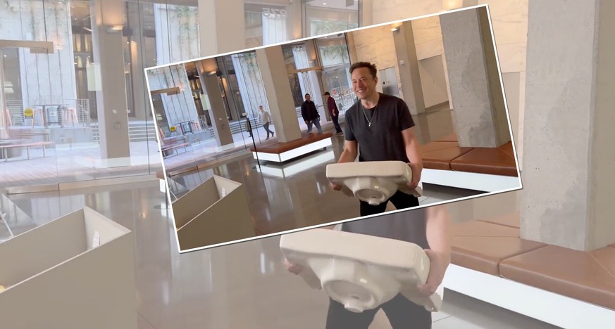 Elon Musk marschier mit einem Lavabo ins Twitter-Hauptquartier