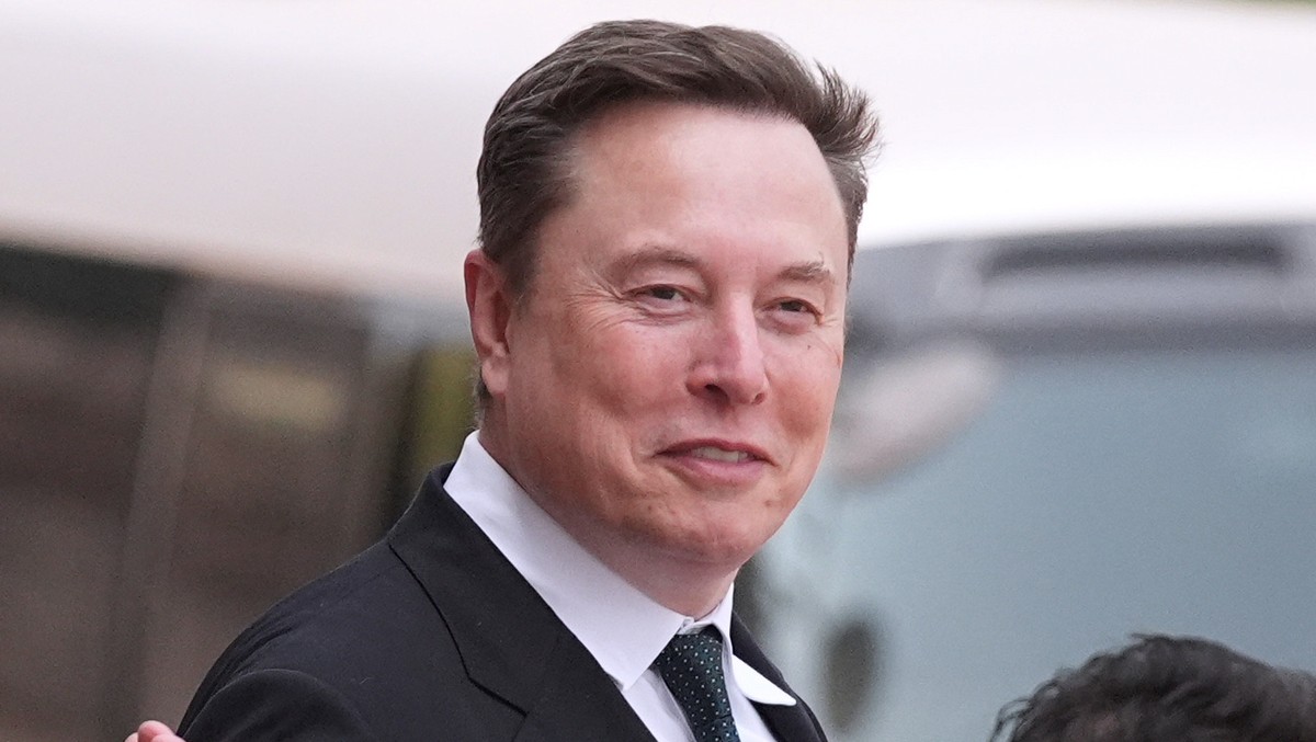FILE - Elon Musk departs after a welcome ceremony with President Donald Trump and China's President Xi Jinping at the Great Hall of the People, May 14, 2026, in Beijing. (AP Photo/Mark Schiefelbe ...