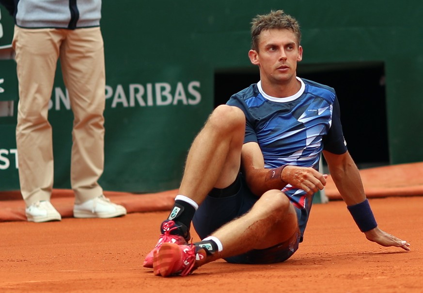 epa07612619 Henri Laaksonen of Switzerland plays Novak Djokovic of Serbia during their men’s second round match during the French Open tennis tournament at Roland Garros in Paris, France, 30 May 2019. ...