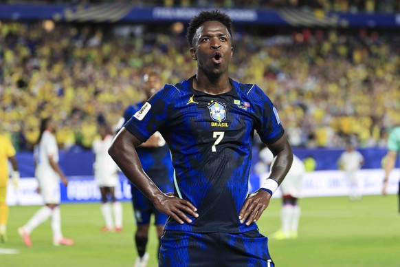 epa13050625 Brazil forward Vinicius Junior celebrates scoring a goal with teammates during the FIFA World Cup 2026 group stage match between Haiti and Brazil, Philadelphia, USA, 19 June 2026. EPA/SHAW ...