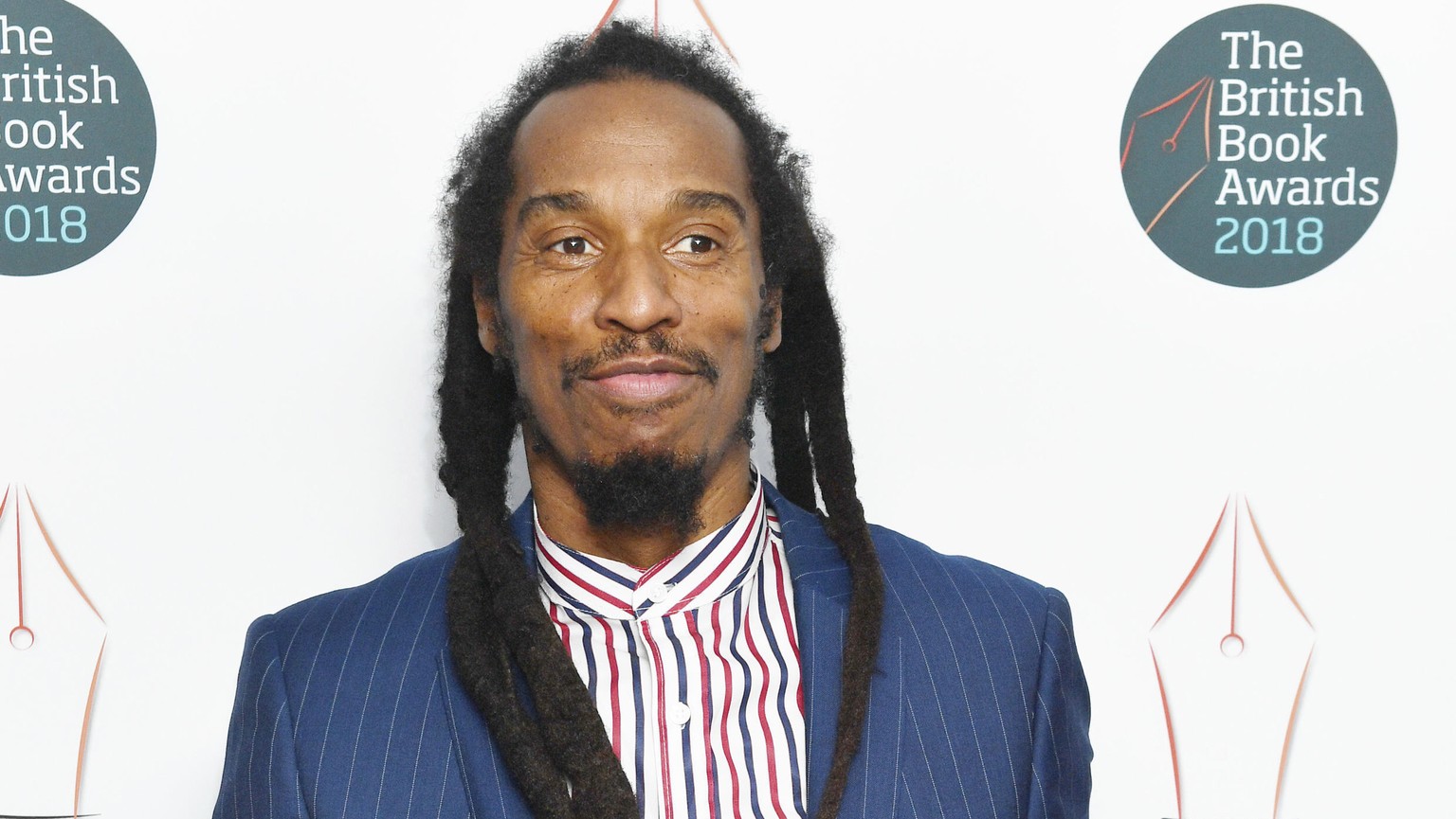 FILE - Benjamin Zephaniah arrives for the British Book Awards at the Grosvenor House Hotel in London, on May 14, 2018. Zephaniah, the British dub poet and political activist who drew huge inspiration  ...