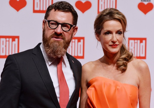 epa03981310 Editor in chief of German mass circulation newspaper &#039;Bild&#039;, Kai Diekmann (L), and his wife Katja Kessler arrive for the charity gala &#039;Ein Herz fuer Kinder&#039; (lit: A Hea ...