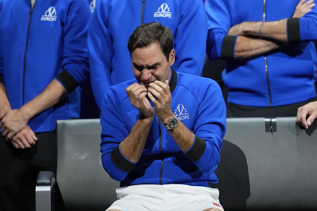 An emotional Roger Federer of Team Europe sits alongside his playing partner Rafael Nadal after their Laver Cup doubles match against Team World's Jack Sock and Frances Tiafoe at the O2 arena in  ...